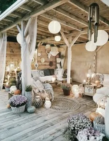 a porch with a lot of furniture and lights