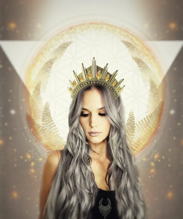 a woman with long grey hair wearing a crown