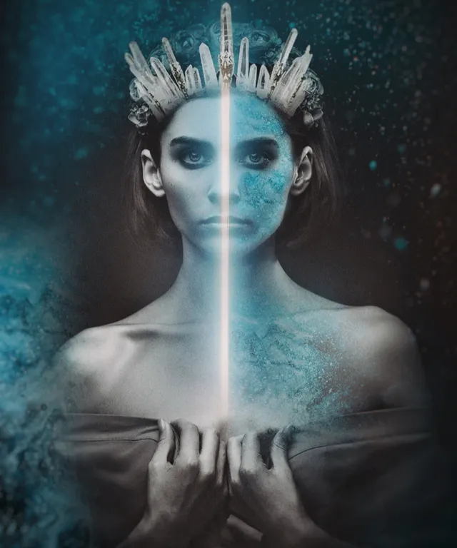 a woman with blue makeup and a crown on her head