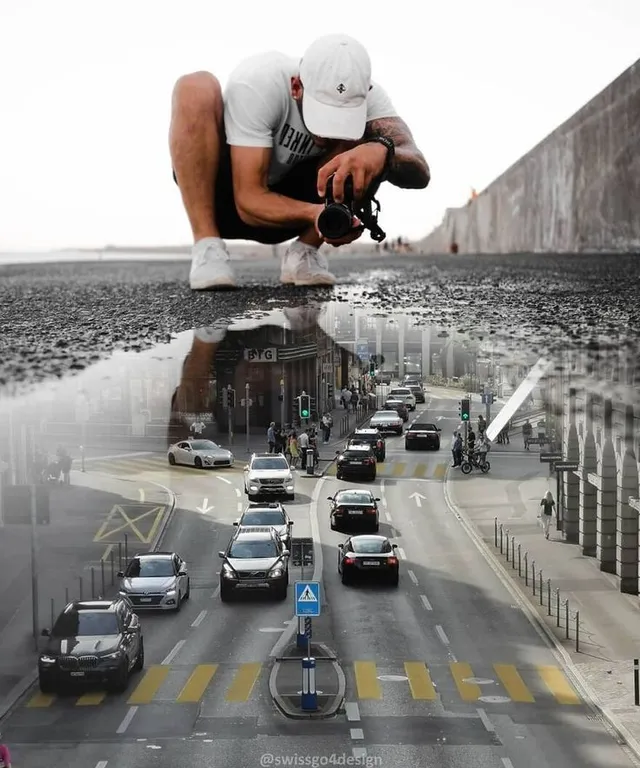 a man taking a picture of a city street