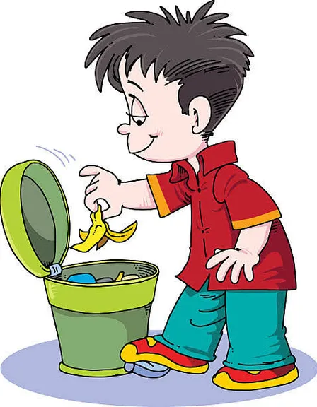 a young boy putting a banana into a trash can