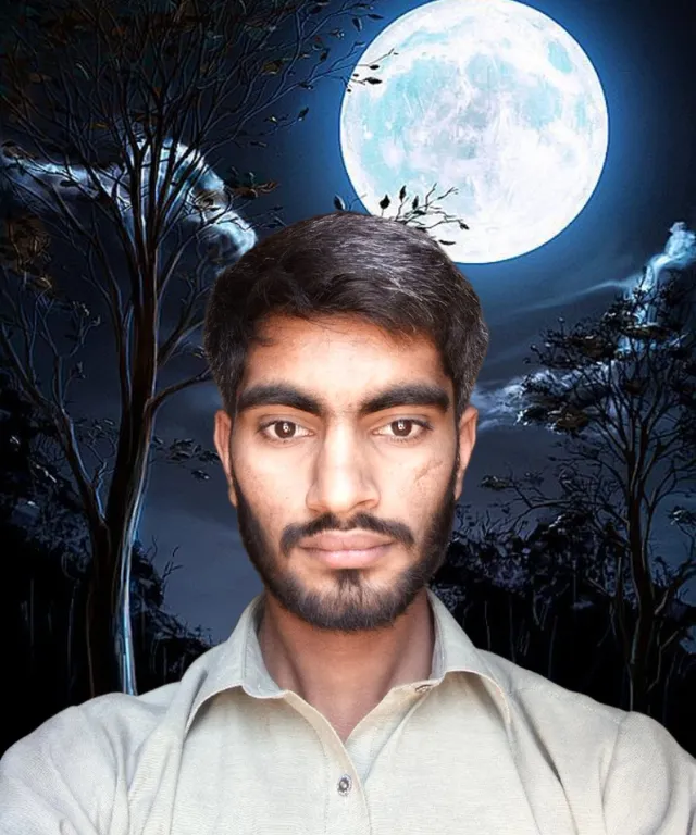 a man standing in front of a full moon