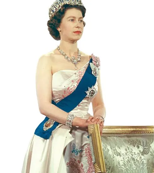 a woman wearing a tiara and holding a picture frame