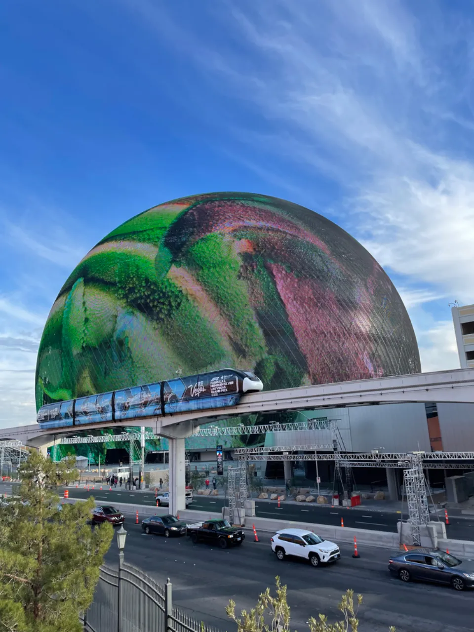 a large orb with a train on it's side