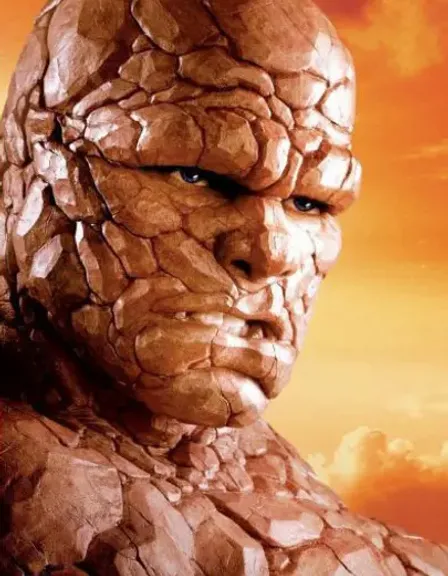 a close up of a person in a costume. eye, fantastic four, jaw, neck, sculpture, gesture, wood, wrinkle, art, statue