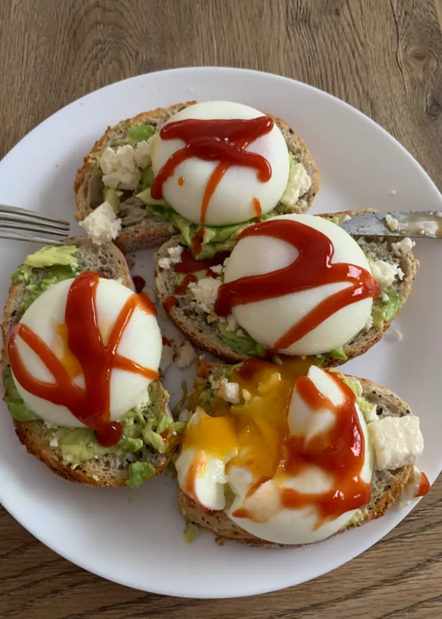 a white plate topped with three open faced sandwiches. food, tableware, ingredient, recipe, cuisine, dish, plate, produce, dishware, garnish