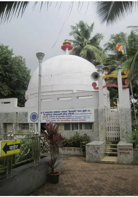 a large white building with a dome on top of it