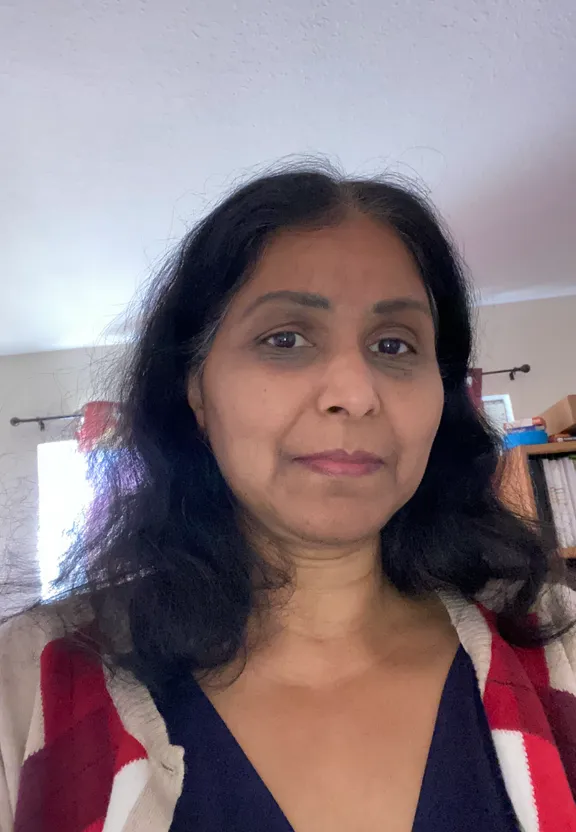 a woman wearing a red and white striped shirt