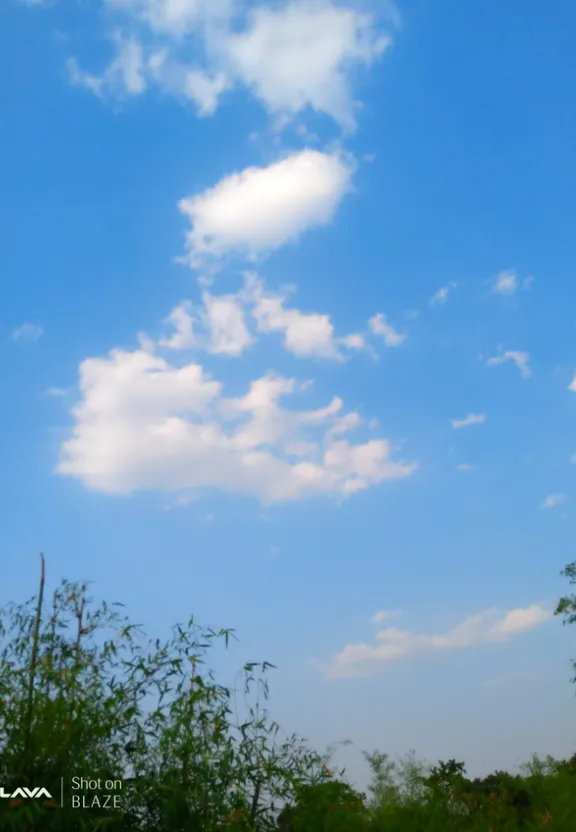 a blue sky with some clouds in it