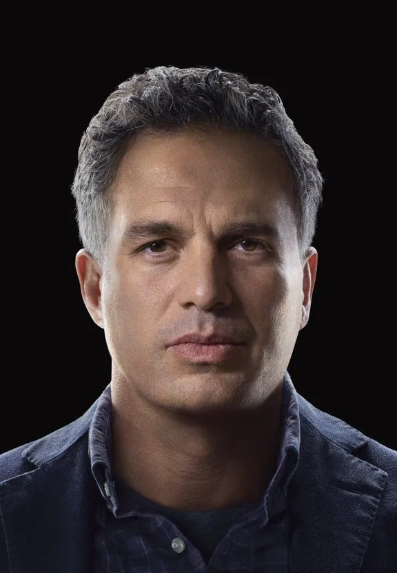 a close up of a person wearing a blue shirt