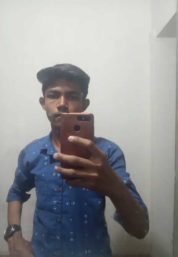 a man taking a selfie in a mirror