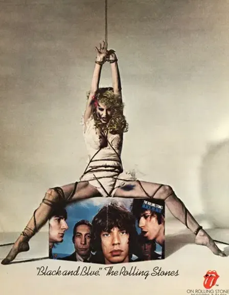 a poster of a woman hanging from a string