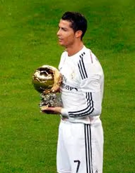 Ronaldo holding a balloon d'or on a field make it look like Ronaldo and add some sharpness and more edits