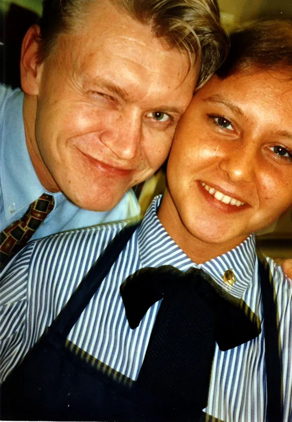 a man and a woman posing for a picture