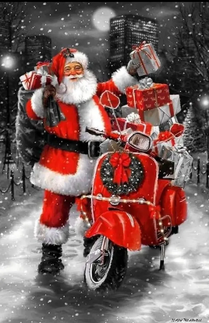 a man dressed as santa claus on a motorcycle