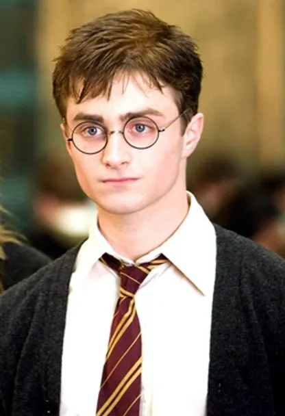 a young man wearing glasses and a tie. forehead, glasses, chin, eyebrow, shirt, vision care, dress shirt, tie, neck, sleeve