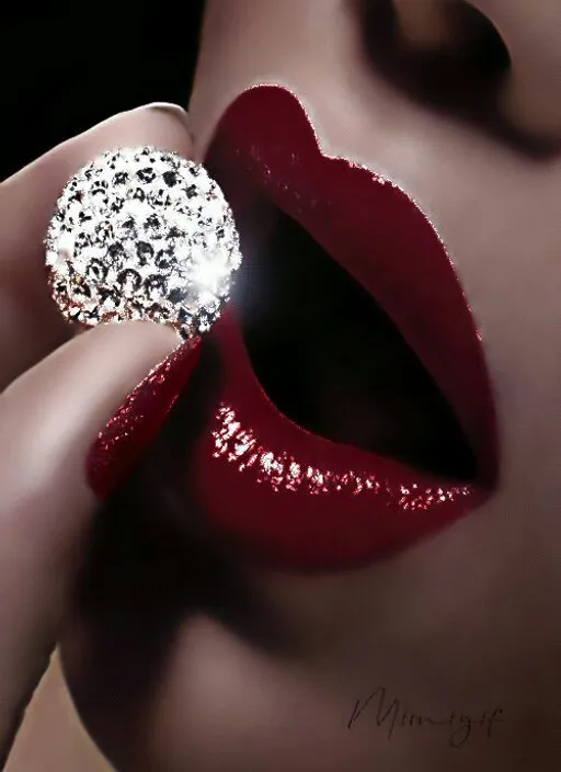 a close up of a woman's lips with a ring on it