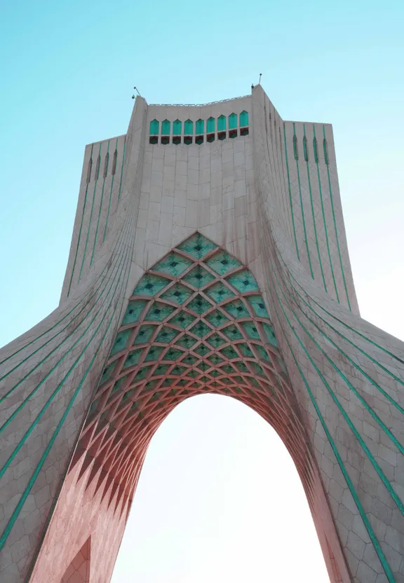 a tall building with a sky background