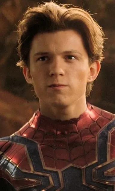 a close up of a person wearing a suit
