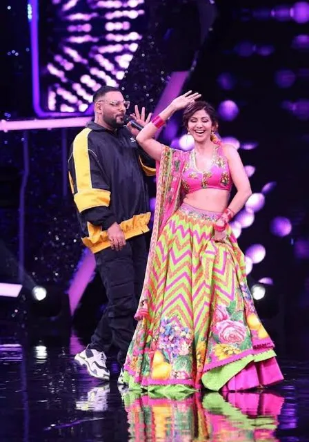 a man and a woman dancing on stage