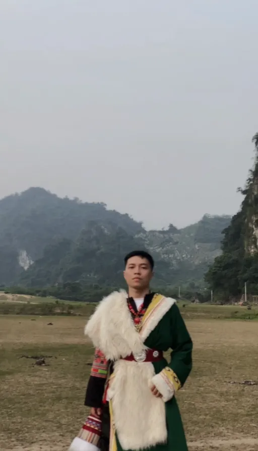 a man in a costume standing in a field
