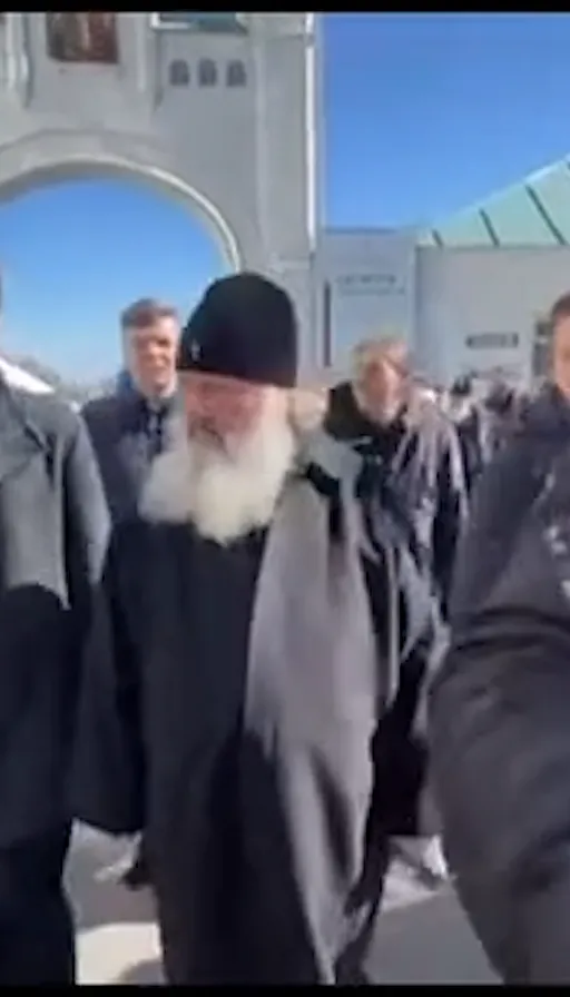 a group of men standing around each other