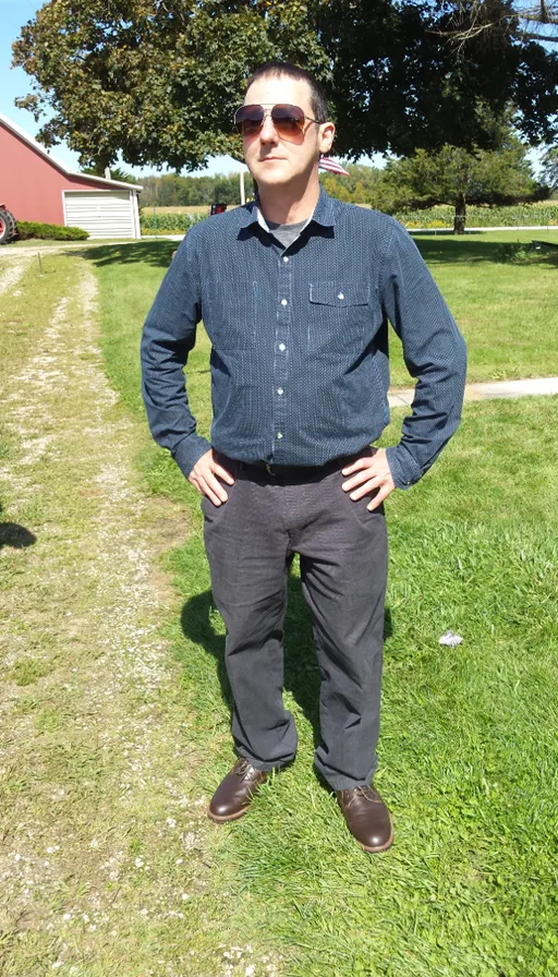 footwear, glasses, plant, dress shirt, sunglasses, beard, neck, sleeve, tree, eyewear