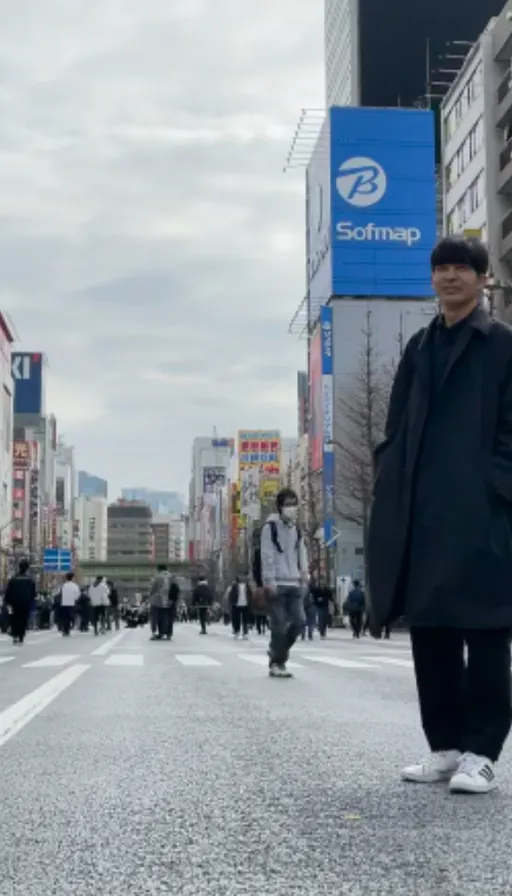 a man standing in the middle of a street