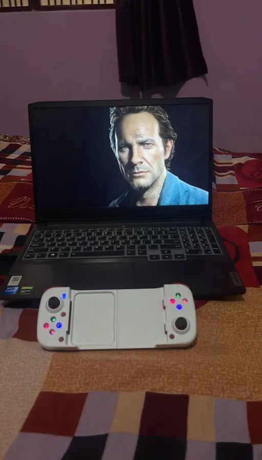 a laptop computer sitting on top of a table