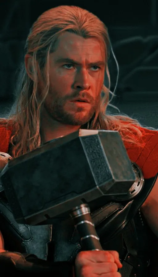 a man with a hammer in his hand