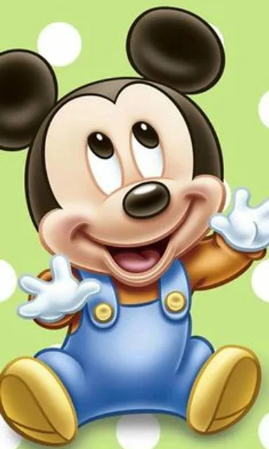 a cartoon mickey mouse sitting on a green background