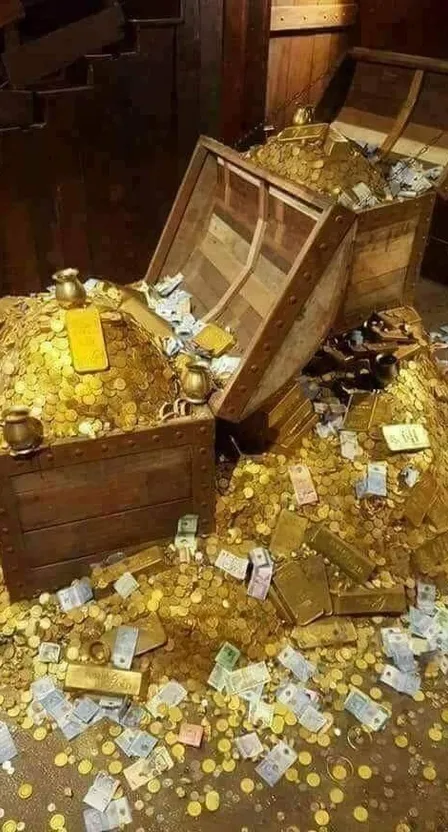 a pile of money sitting on top of a floor