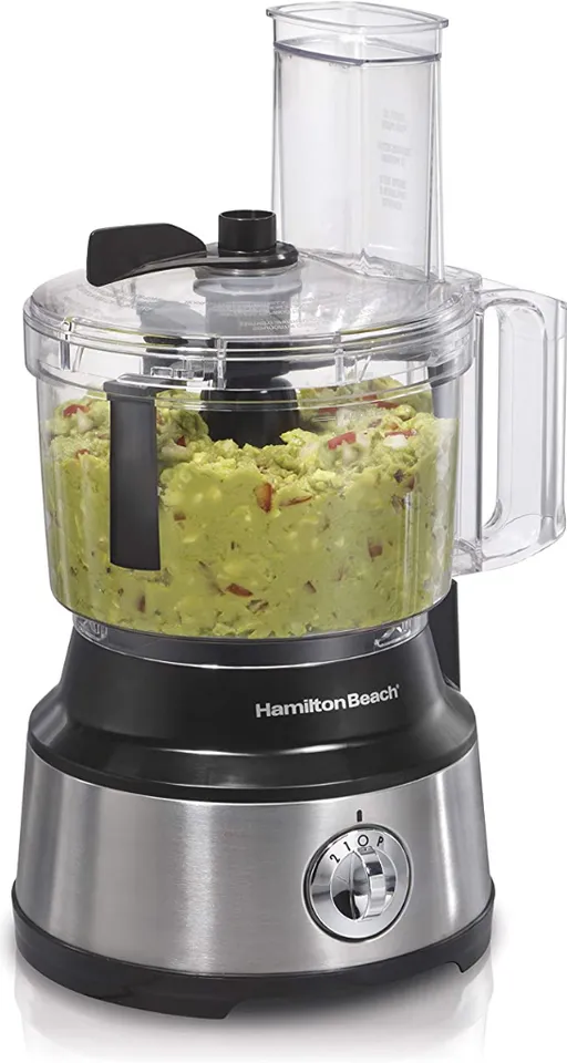 a food processor with food inside of it