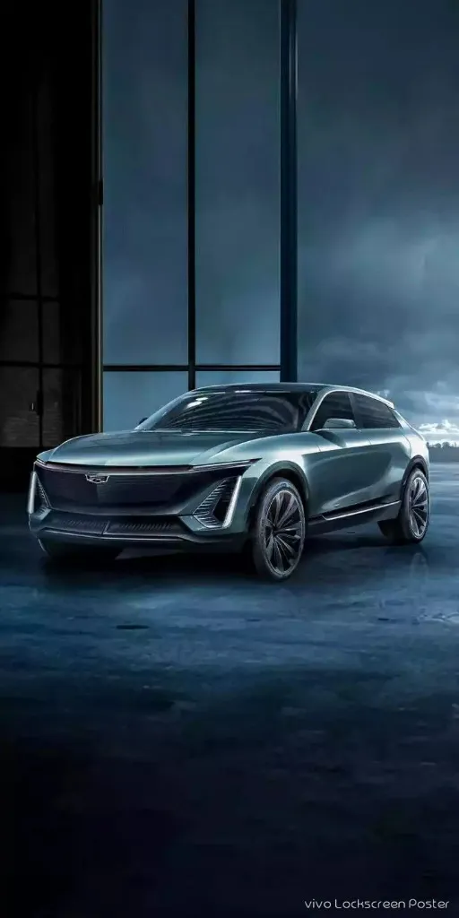 a silver car parked in front of a building