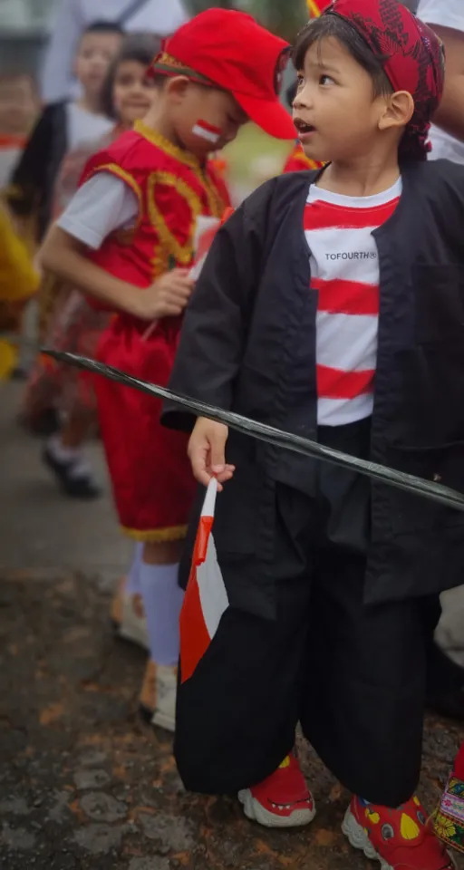a group of children dressed up in costumes