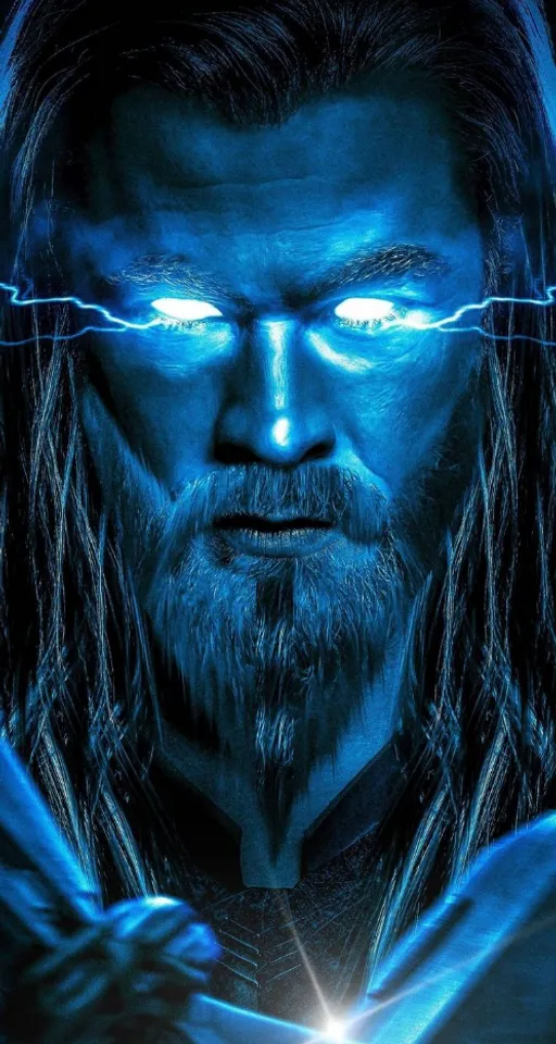 a man with long hair and blue eyes