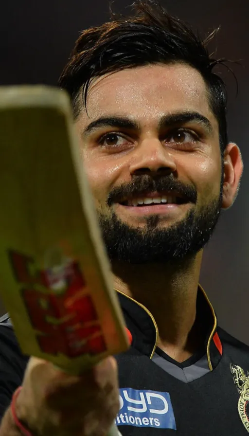 a close up of a person holding a cricket bat. make it a cricket bat