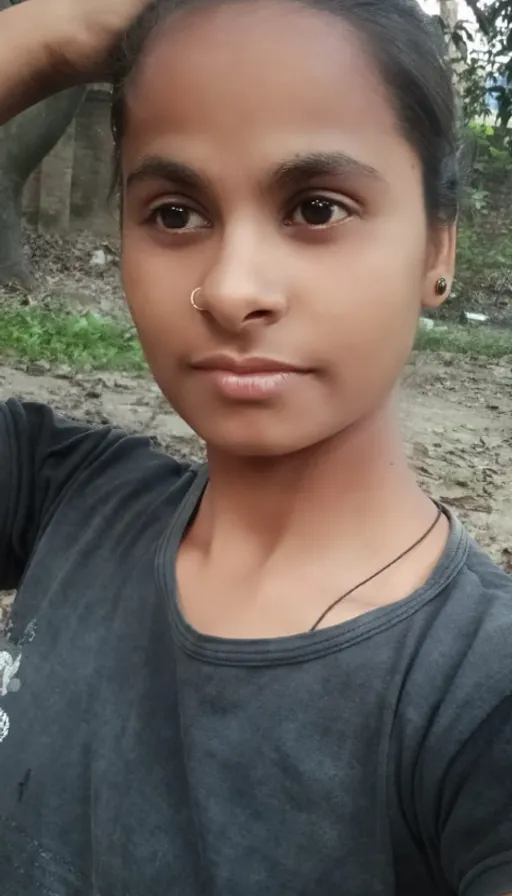 a young girl is posing for a picture