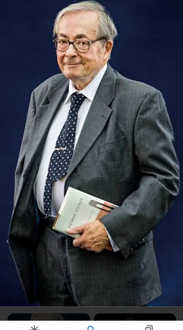 a man in a suit and tie holding a book