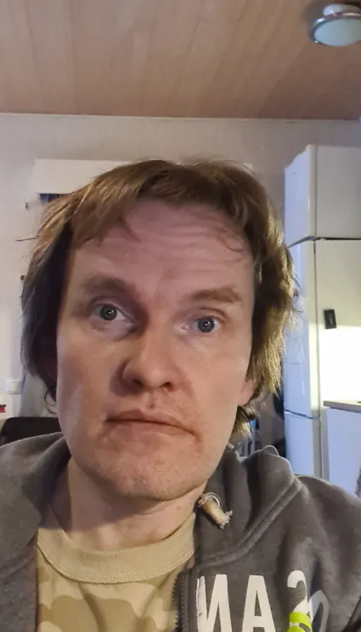 a man with a surprised look on his face
