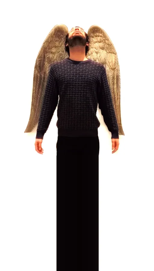 a man in a long skirt with an angel wings on his head