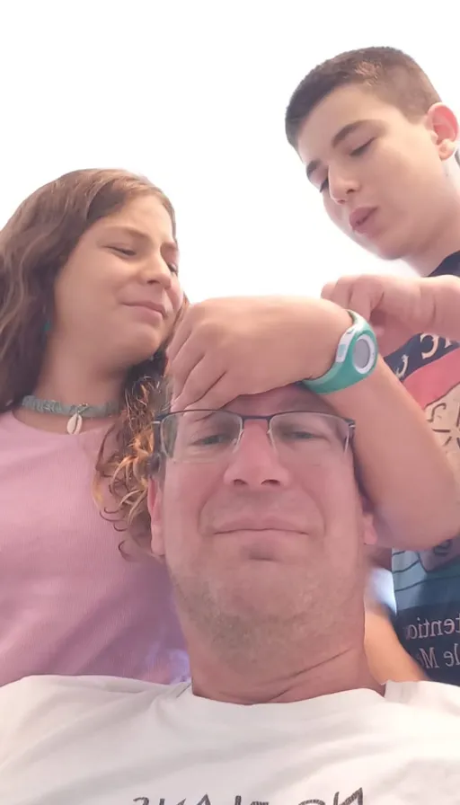 a man with glasses and a little boy