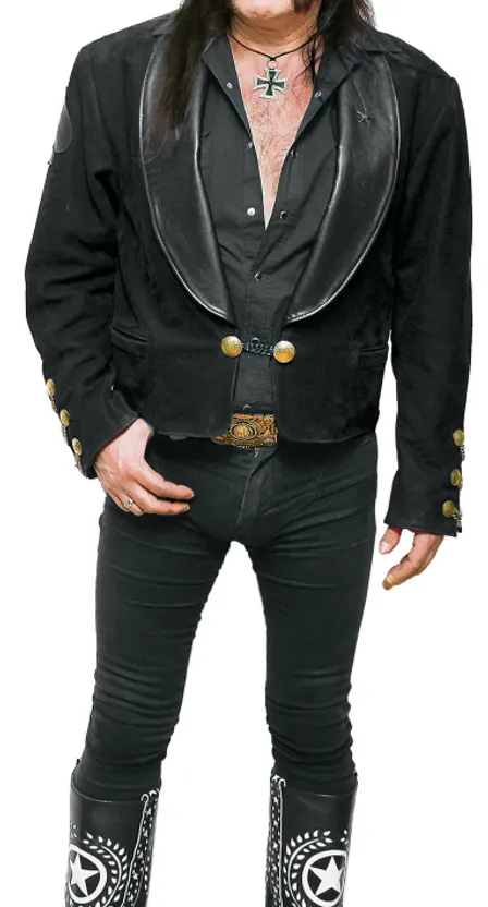 a man in a black jacket and pants
