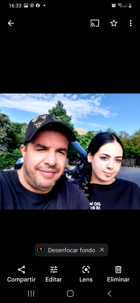 a man and a woman taking a selfie