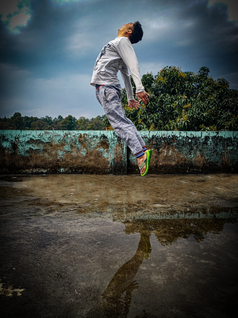 a person jumping in the air on a skateboard