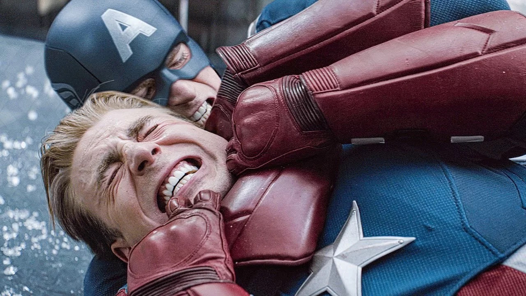 a man in a captain america costume laying on the ground