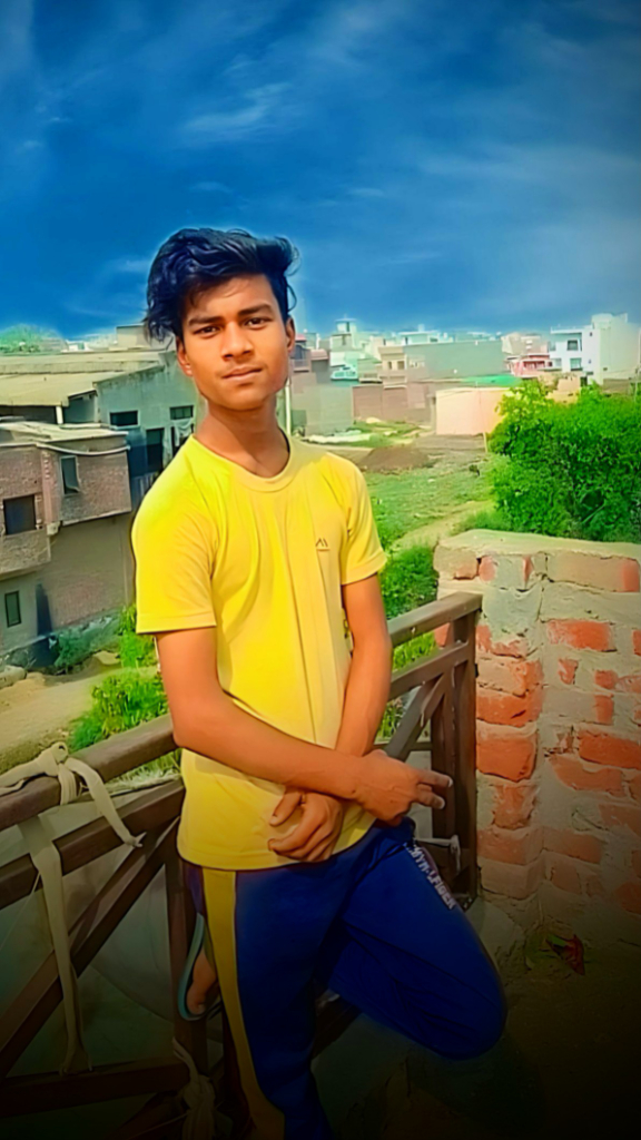 a boy in a yellow shirt is standing on a balcony