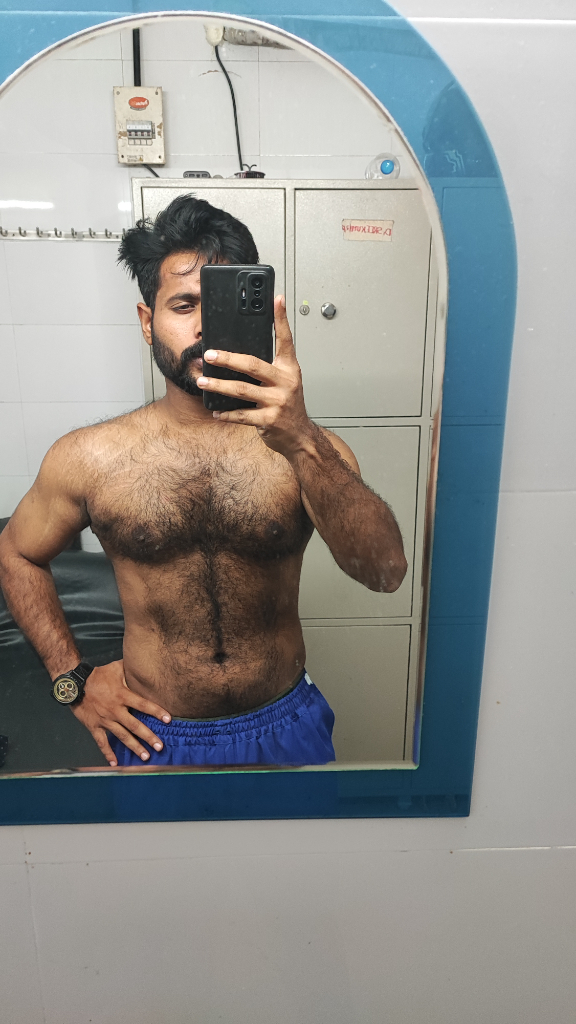 Selfie Mirror Man with Muscular Gums. Instead of a selfie, this man is taking a picture of himself with his shadow and he has  muscular gum body.