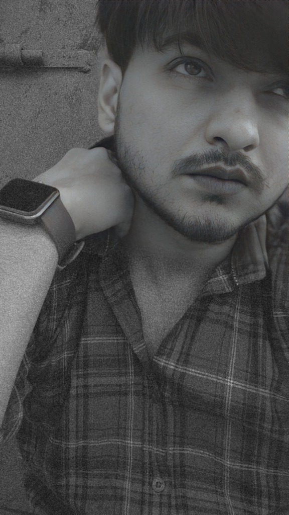 a man with a watch on his wrist