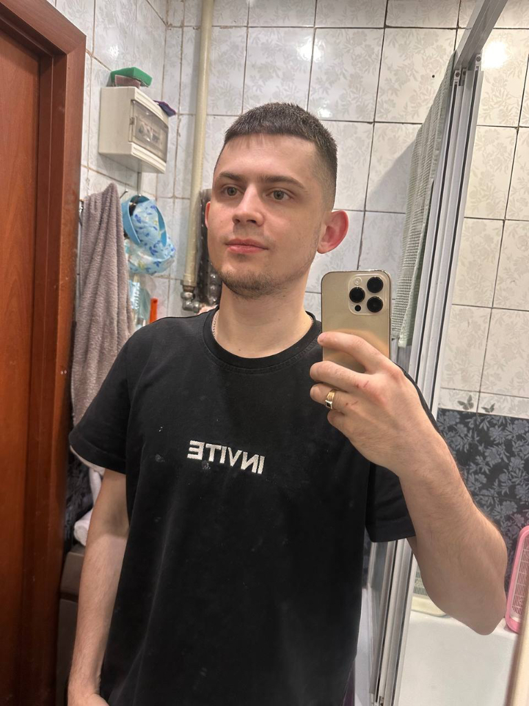  a man taking a selfie in a... | Image by BroccoliSystematic